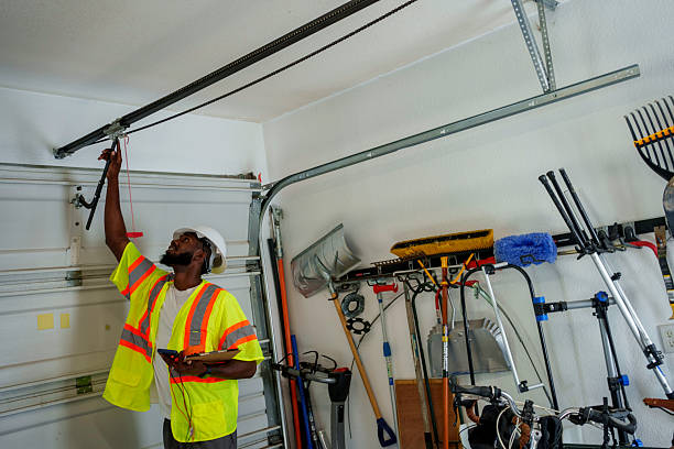 Professional Garage Door Panel Replacement technician working in Atwater, MN